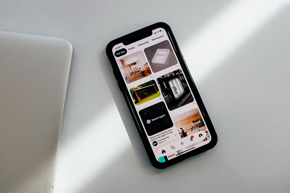 Smartphone showing a messaging app on a desk
